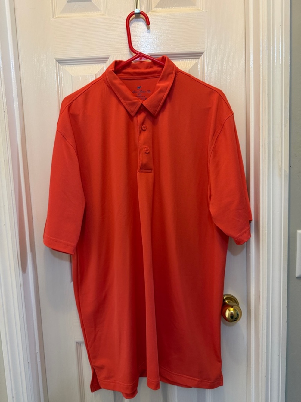 Men's Short-Sleeve Performance Polo in Bright Orange